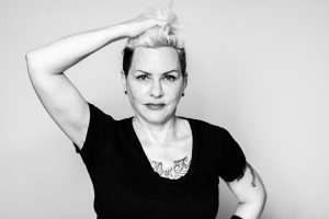 black and white photo of pk mutch, white woman with short cropped hair