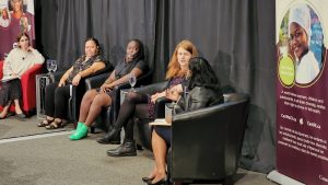 An image showing four panelists at the Gender Equality Summit 2022. All women.